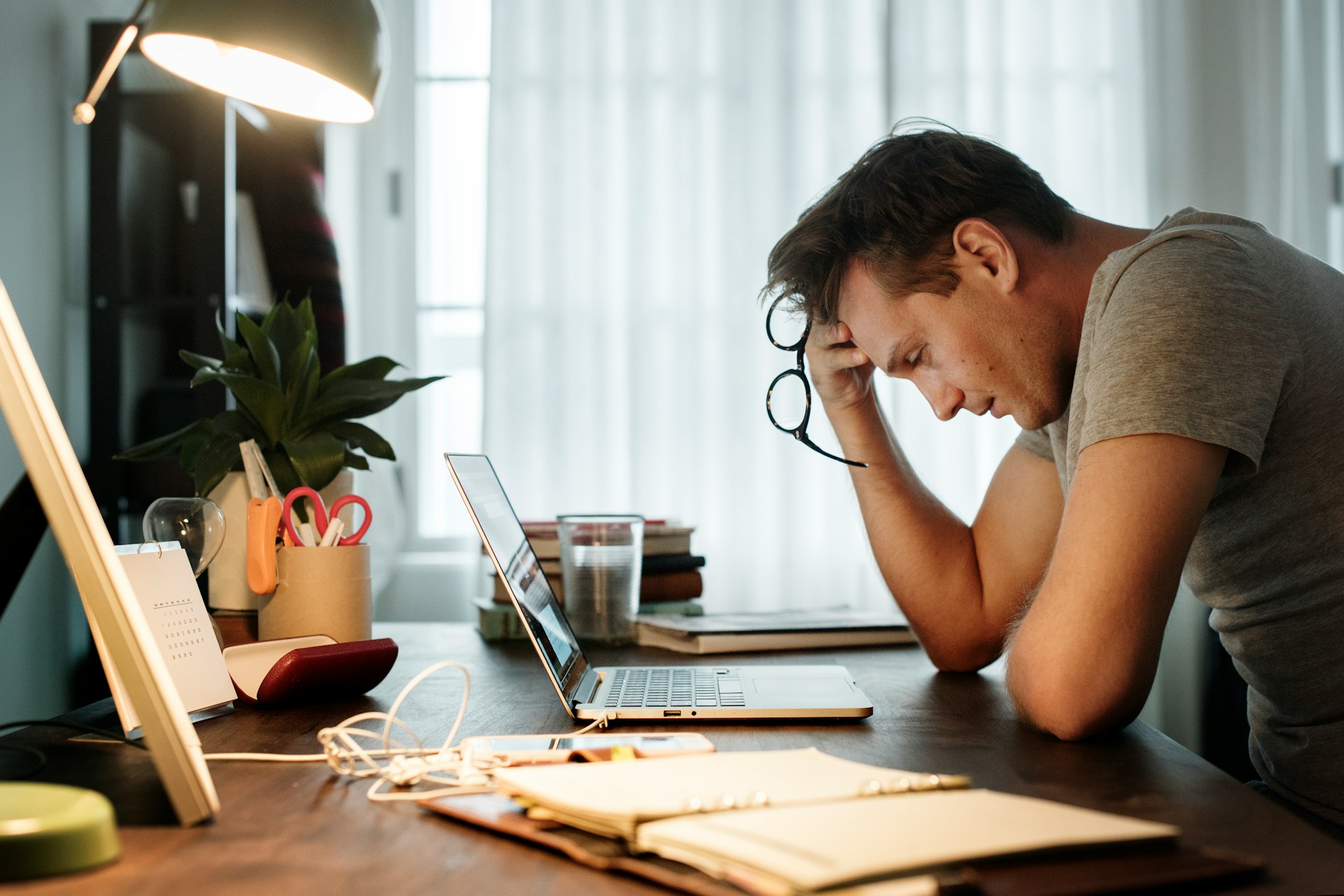 A contractor on the phone between jobs — the daily reality of running the business and being run by it.